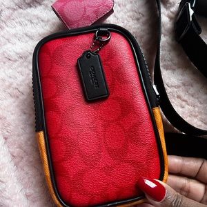 Coach Multifunction Phone Pack In Blocked Signature Canvas